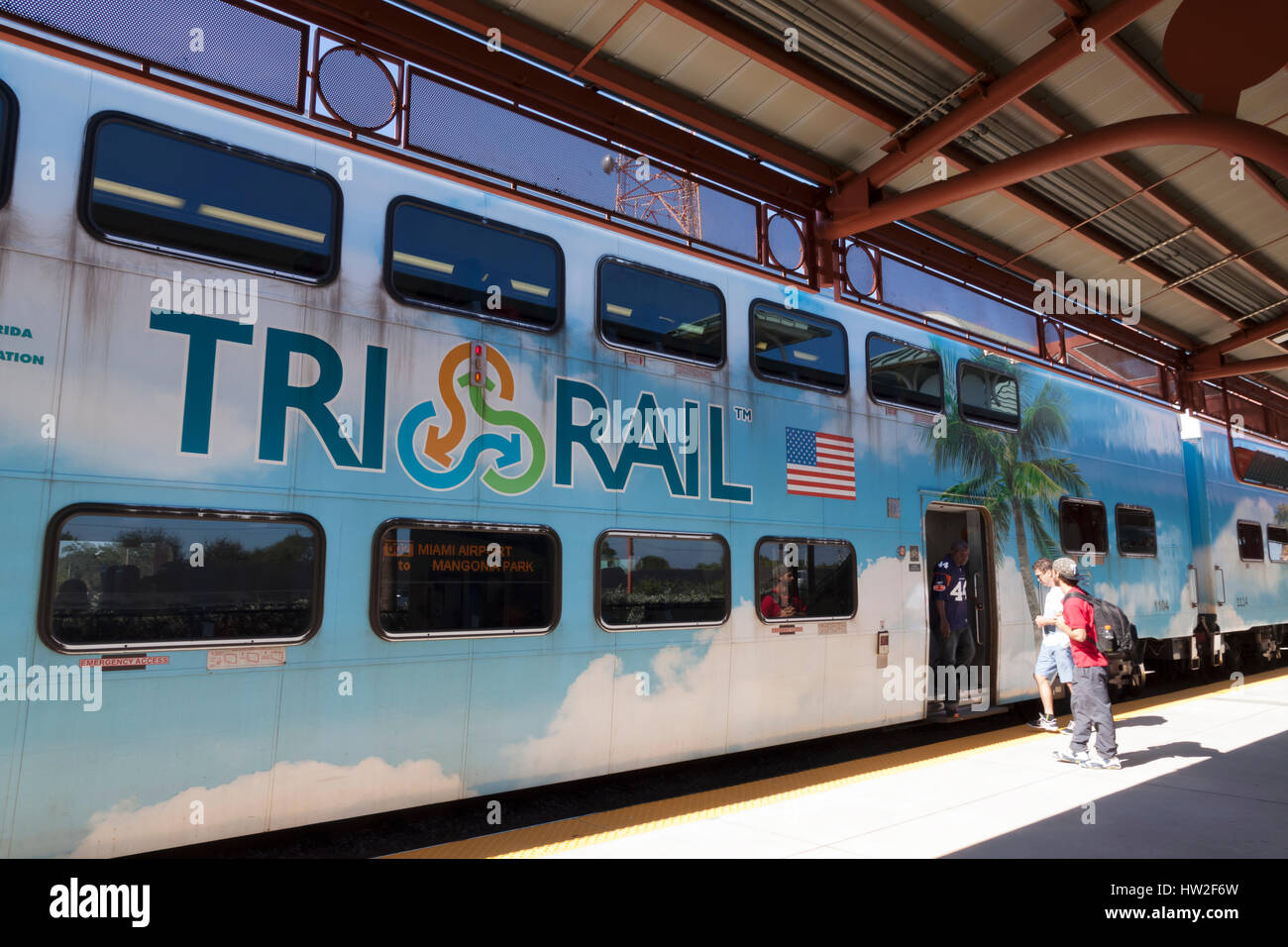 Passengers boarding Florida's Tri Rail train. Stock Photo