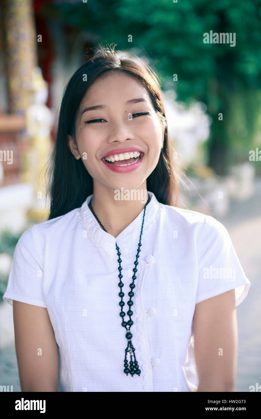Portrait of smiling Asian woman Stock Photo