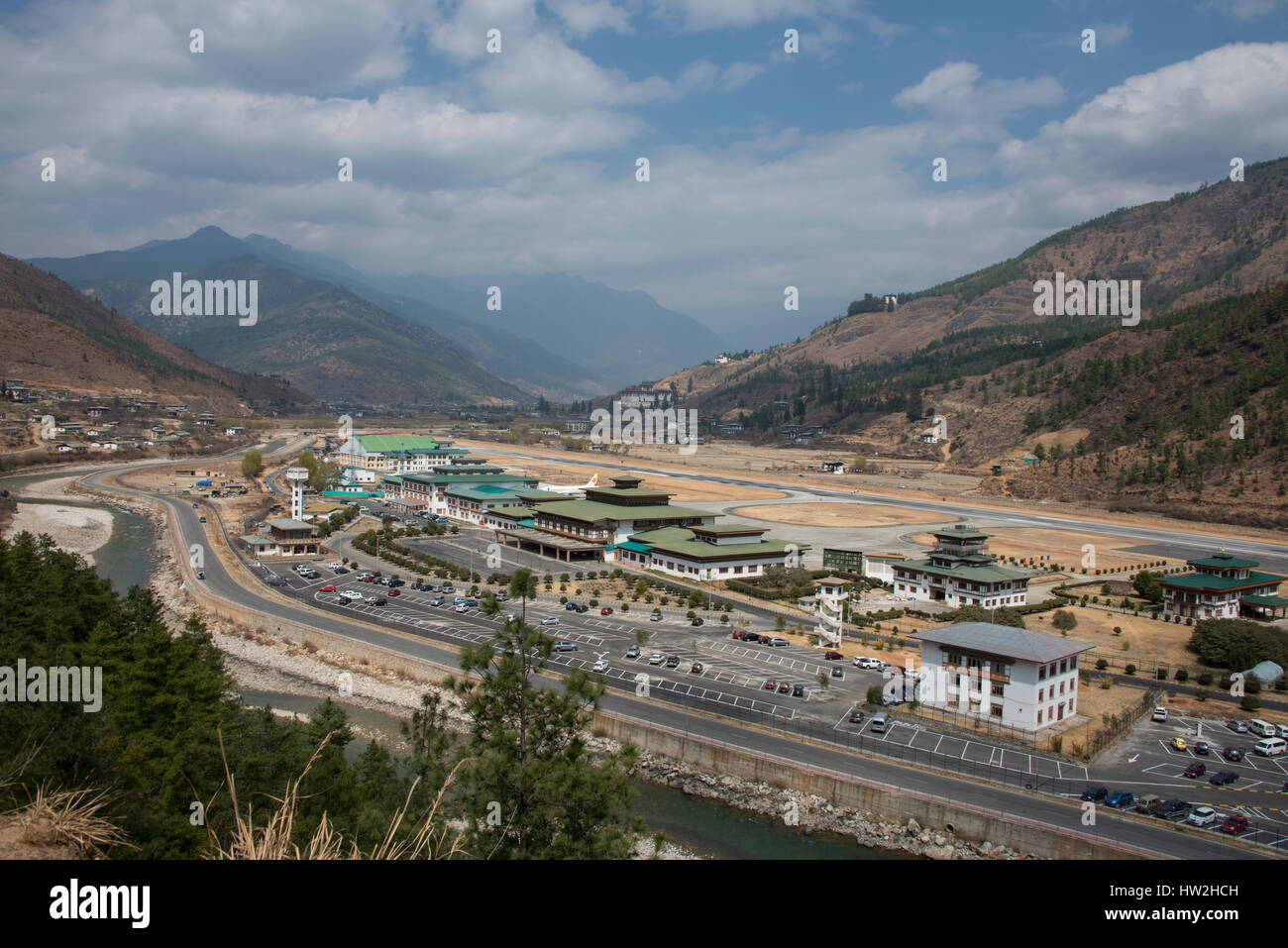 Bhutan, Paro. Paro Airport, is the only international airport in the Kingdom of Bhutan. It's considered one of the world's most challenging airports,  Stock Photo