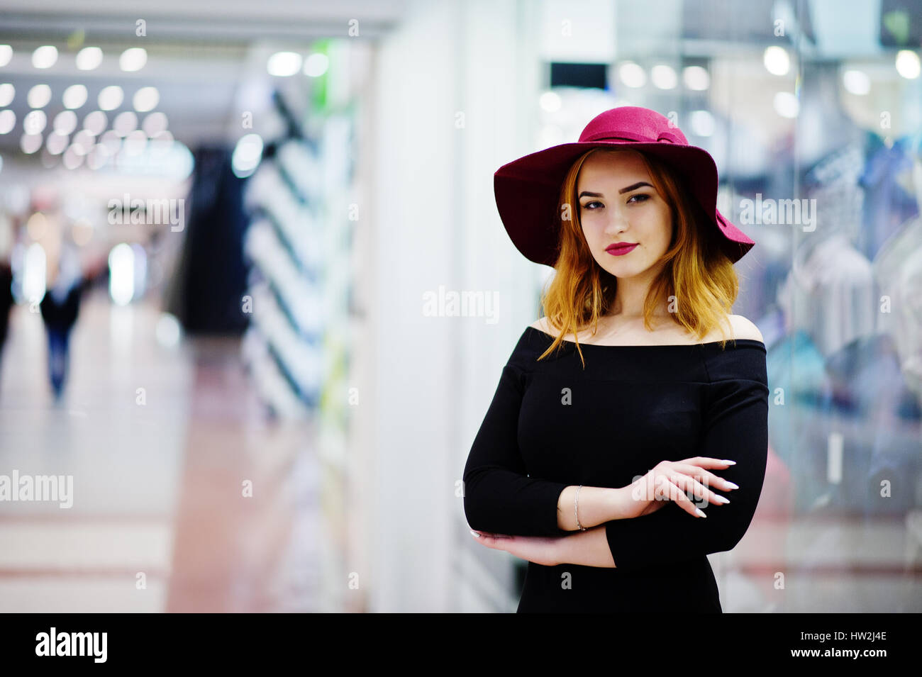 Fashion red haired girl wear on black 