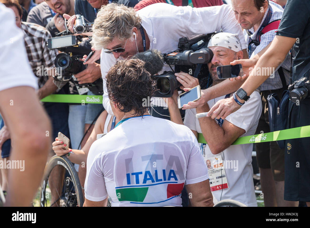 A lot of journalists trying to have an interview with the champion Alex Zanardi Stock Photo