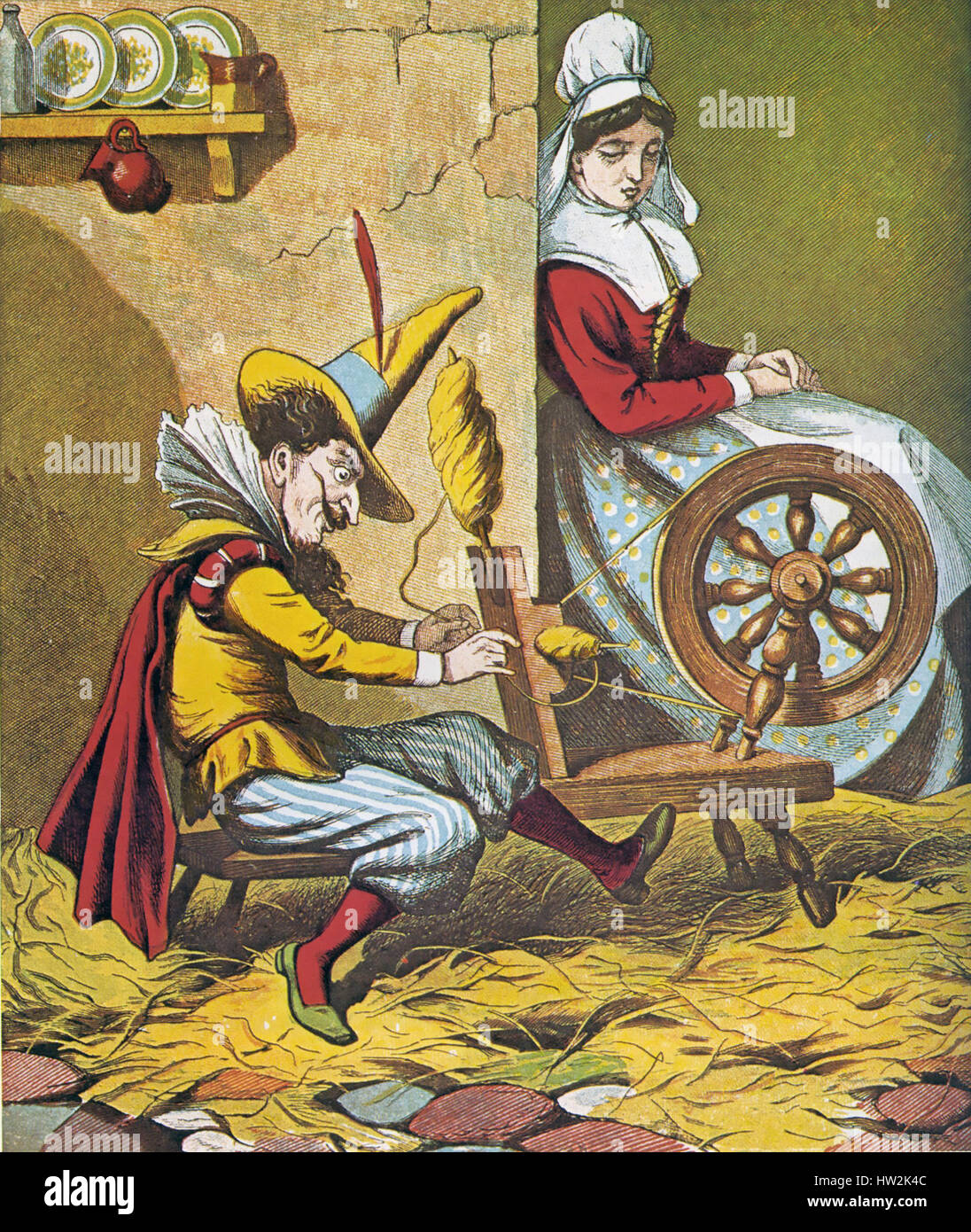 RUMPELSTILTSKIN fairy tale collected by the Brothers Grimm. Here he helps the miller's daughter with her spinning in an 1870 illustration from Routledge's Coloured Picture Book Stock Photo