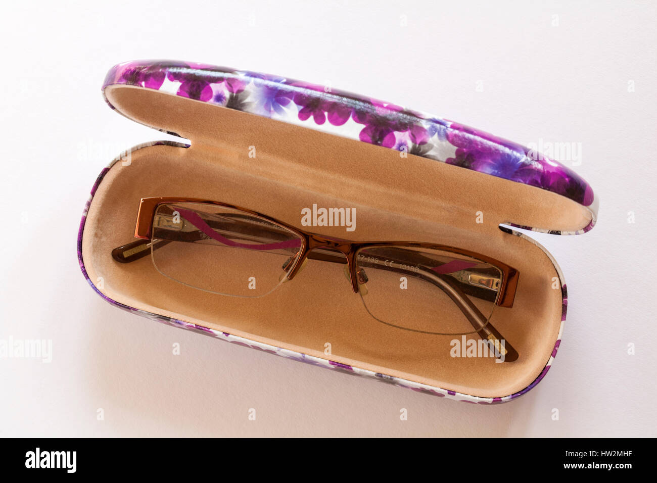 pair of Kyusu glasses in colourful glasses case isolated on white background Stock Photo