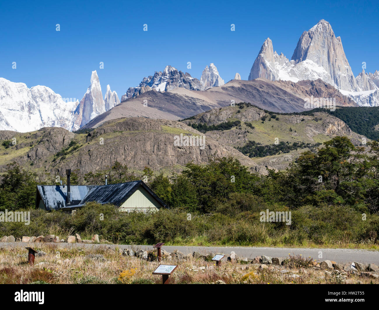 View towards famous Fitz Roy mountain range, Cerro Torre peak left, seen from park administration,  El Chalten, Los Glaciares National Park, Patagonia Stock Photo