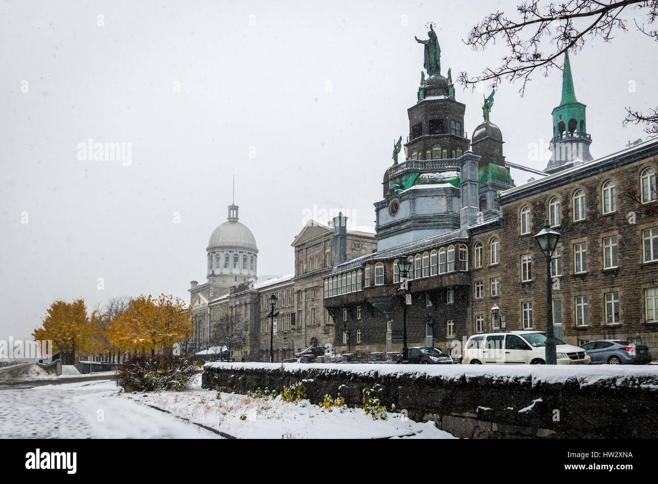 Old Montreal with Bonsecours Market and Notre-Dame-de-Bon-Secours Chapel during a snow day - Montreal, Quebec, Canada Stock Photo