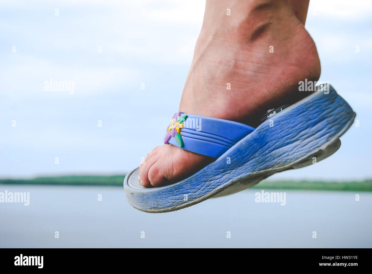 Wearing flip flops hi-res stock photography and images - Alamy