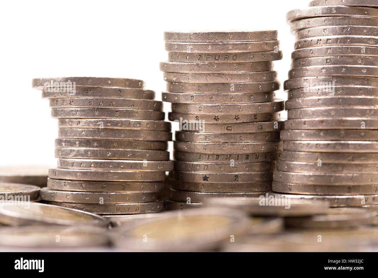 Heap of two euro coins isolated on white background Stock Photo - Alamy