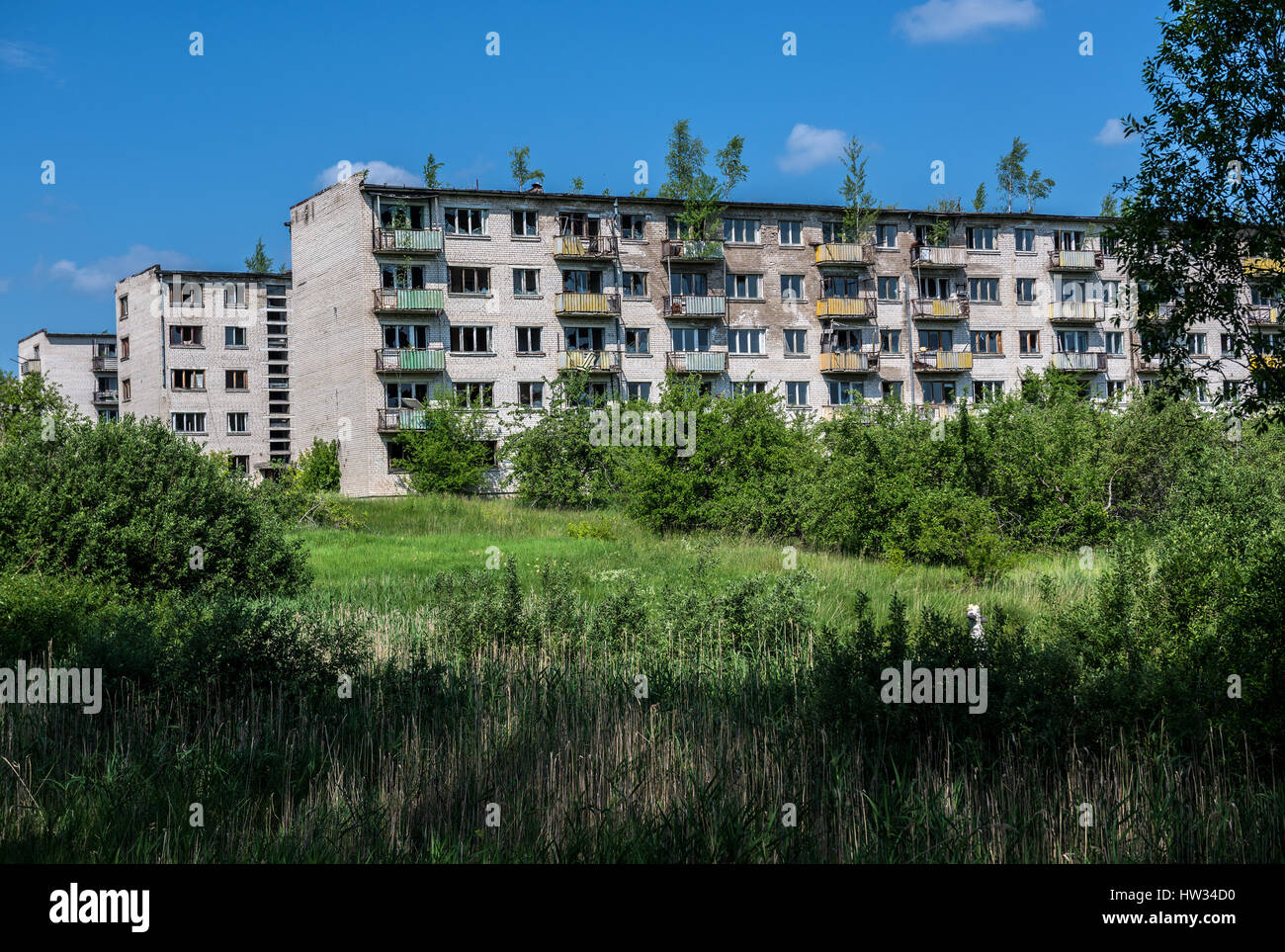 Abandoned residential buildings in Skrunda-1 ghost town, former site of Soviet Dnepr radar station from Cold War period near Skrunda town in Latvia Stock Photo