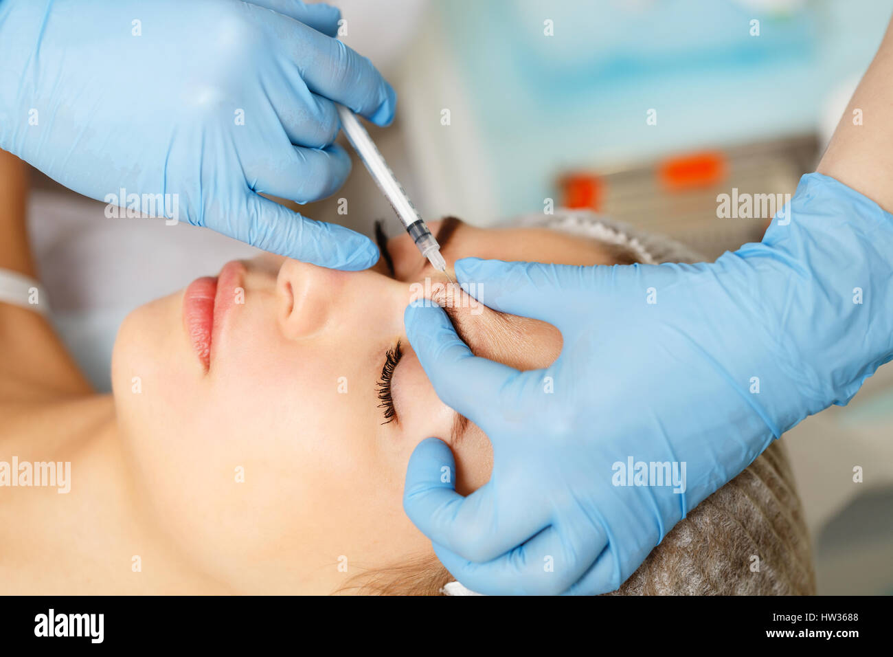 Injections under the skin. The injection the skin above the eyebrow