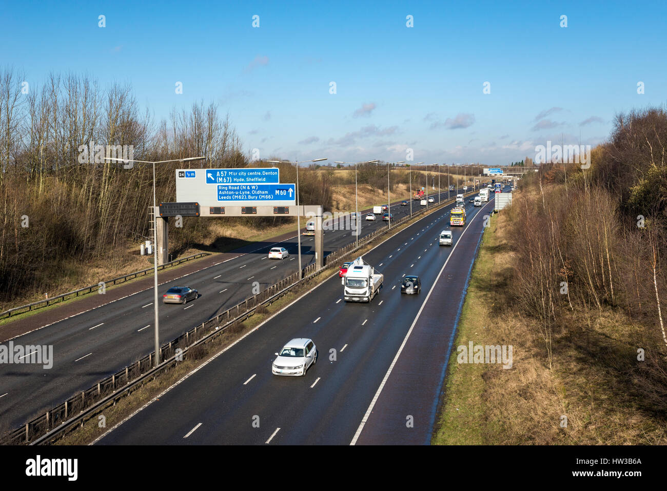 Vehicles on the M60 motorway near Stockport, Greater Manchester, England. Stock Photo