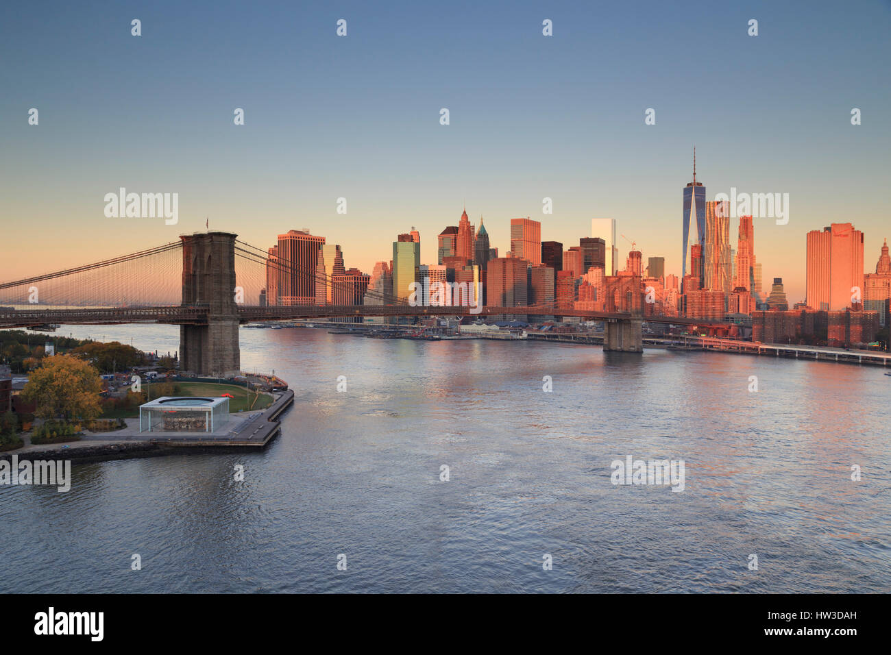 USA, New York City, Brooklyn Bridge and Lower Manhattan Skyline Stock Photo