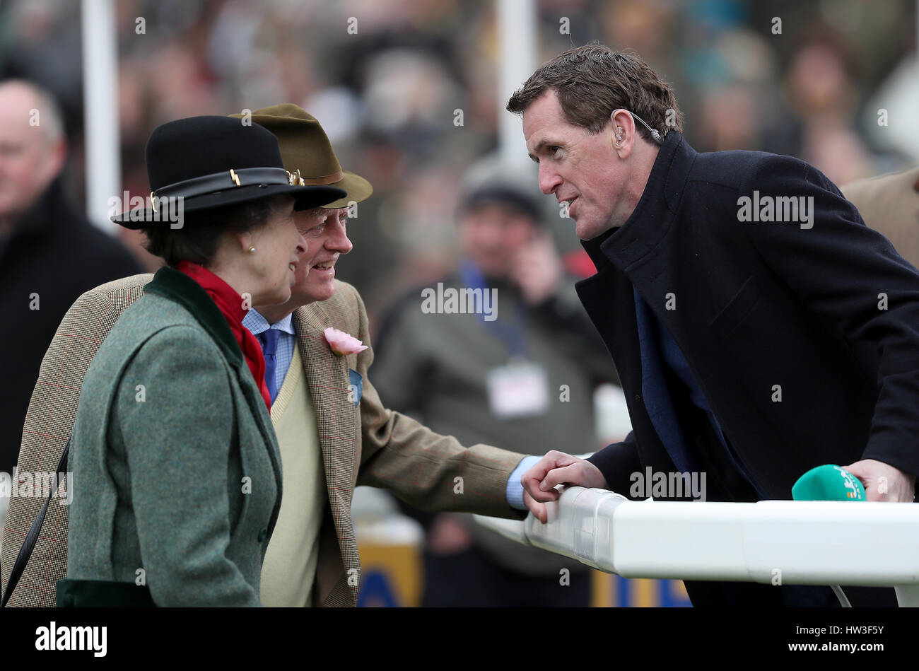 Princess Anne talks to AP McCoy during St Patrick's Thursday of the 2017 Cheltenham Festival at Cheltenham Racecourse. PRESS ASSOCIATION Photo. Picture date: Thursday March 16, 2017. See PA story RACING Cheltenham. Photo credit should read: David Davies/PA Wire. RESTRICTIONS: Editorial Use only, commercial use is subject to prior permission from The Jockey Club/Cheltenham Racecourse. Stock Photo