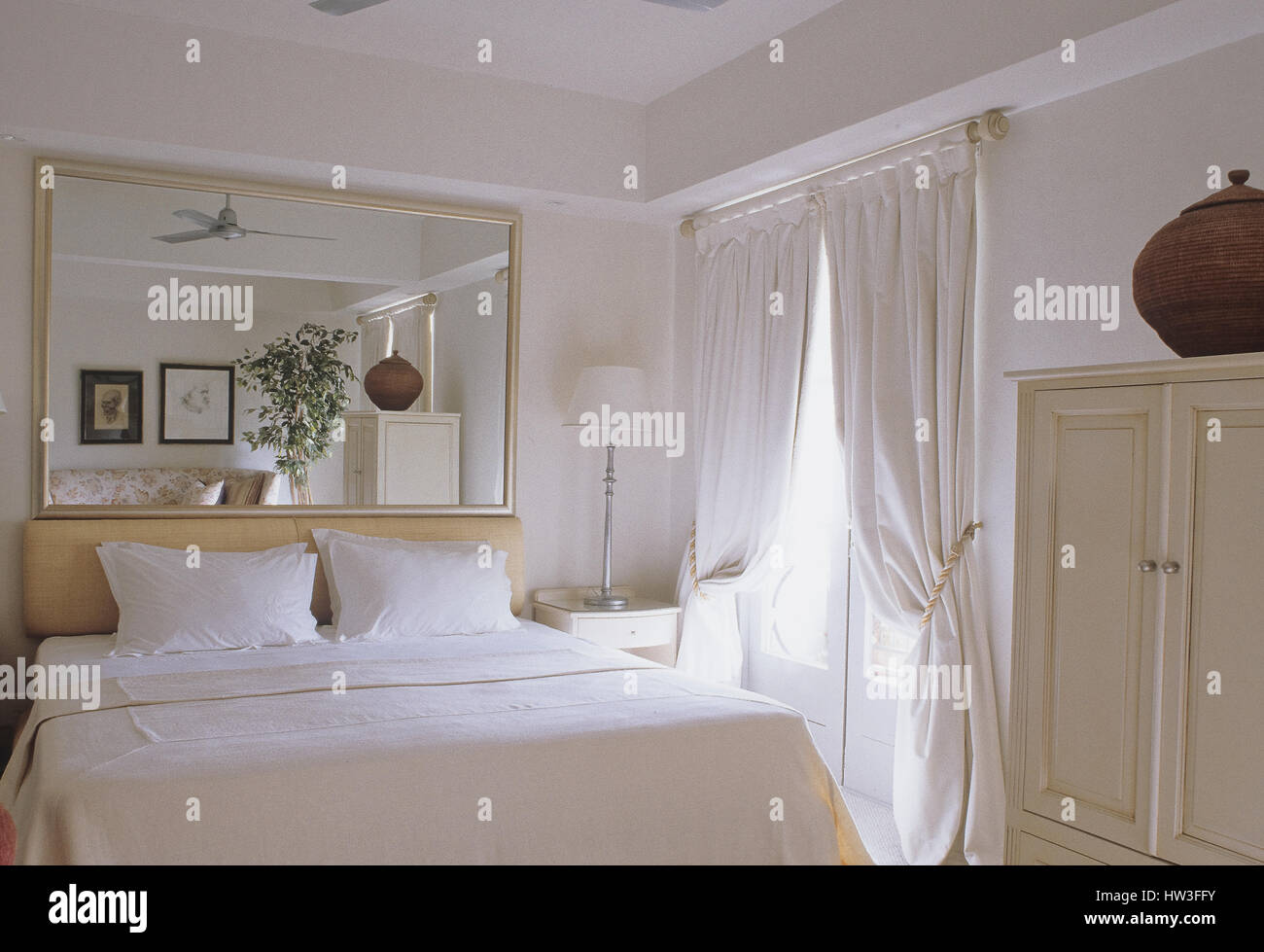 Minimalist bedroom. Stock Photo