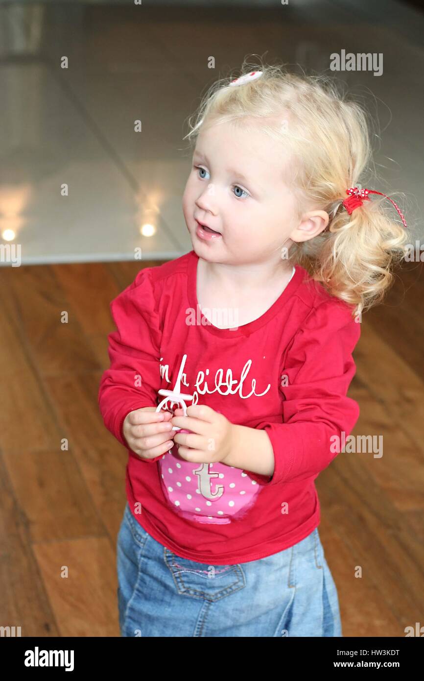 Toddler wearing an 'im a little teapot' top Stock Photo Alamy