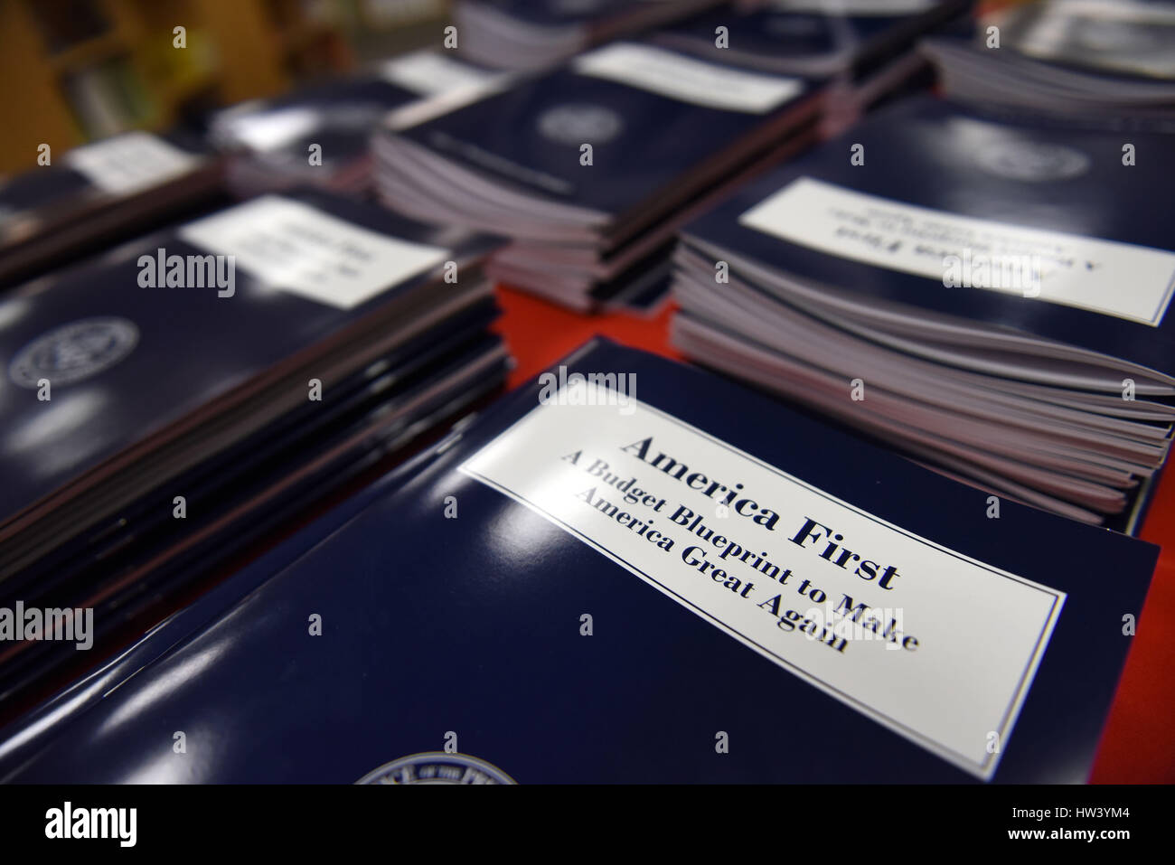 Washington, USA. 16th Mar, 2017. Copies of U.S. President Donald Trump administration's first budget blueprint are seen in Washington, DC, the United States, on March 16, 2017. U.S. President Donald Trump on Thursday unveiled the administration's first budget blueprint which seeks deep cuts across federal departments and agencies in order to fund rising defense spending. Credit: Yin Bogu/Xinhua/Alamy Live News Stock Photo