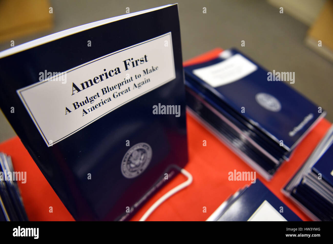Washington, USA. 16th Mar, 2017. Copies of U.S. President Donald Trump administration's first budget blueprint are seen in Washington, DC, the United States, on March 16, 2017. U.S. President Donald Trump on Thursday unveiled the administration's first budget blueprint which seeks deep cuts across federal departments and agencies in order to fund rising defense spending. Credit: Yin Bogu/Xinhua/Alamy Live News Stock Photo