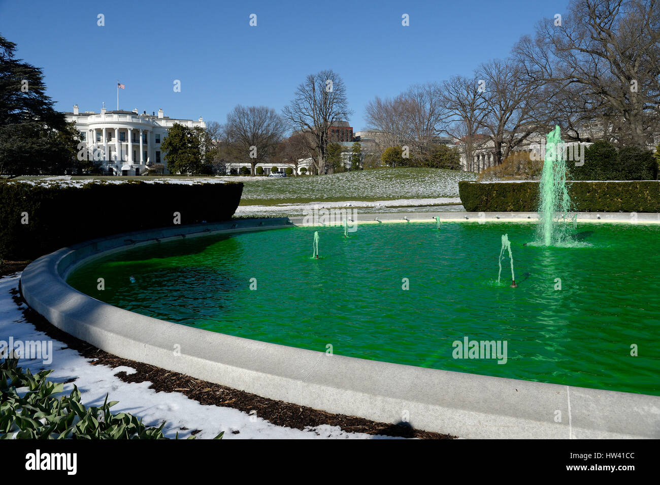 Washington DC, USA. 16th March 2017. Fountain on the South side of the White House is dyed green for St. Patrick's Day in Washington, DC, on March 16, 2017 in Washington, DC. Credit: Olivier Douliery/Pool via CNP /MediaPunch/Alamy Live News Stock Photo