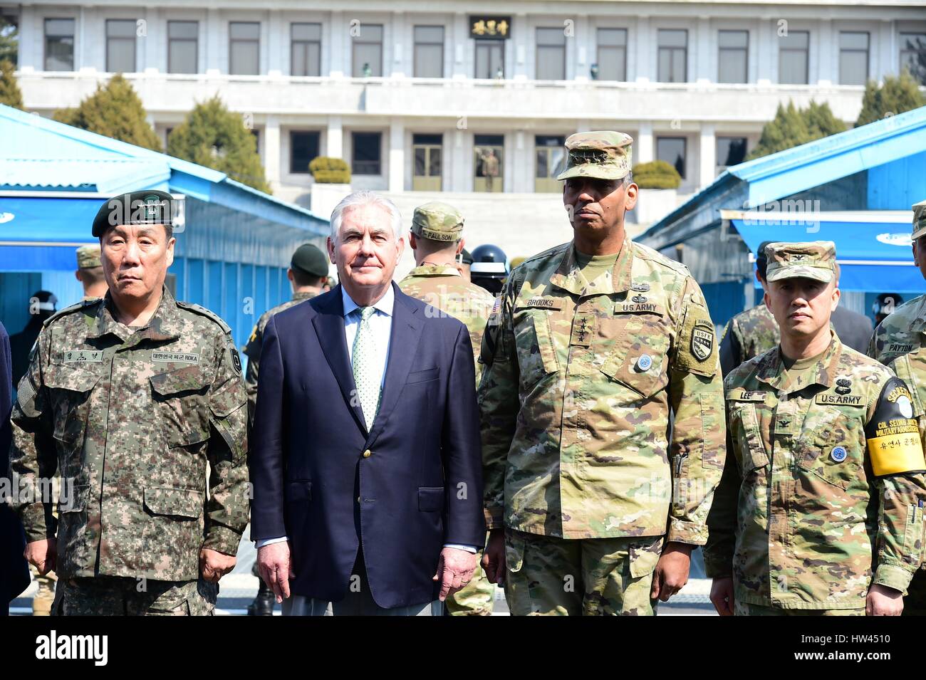 Seoul, South Korea. 17th March 2017. U.S. Secretary of State Rex Tillerson, center, and Gen. Vincent Brooks, U.S. Forces Korea commander, pose for a group photo during a tour of the Joint Security Area at the Korean Demilitarized Zone March 17, 2017 in Panmunjom, South Korea. Tillerson is on his first trip to Asia as Secretary of State. Credit: Planetpix/Alamy Live News Stock Photo