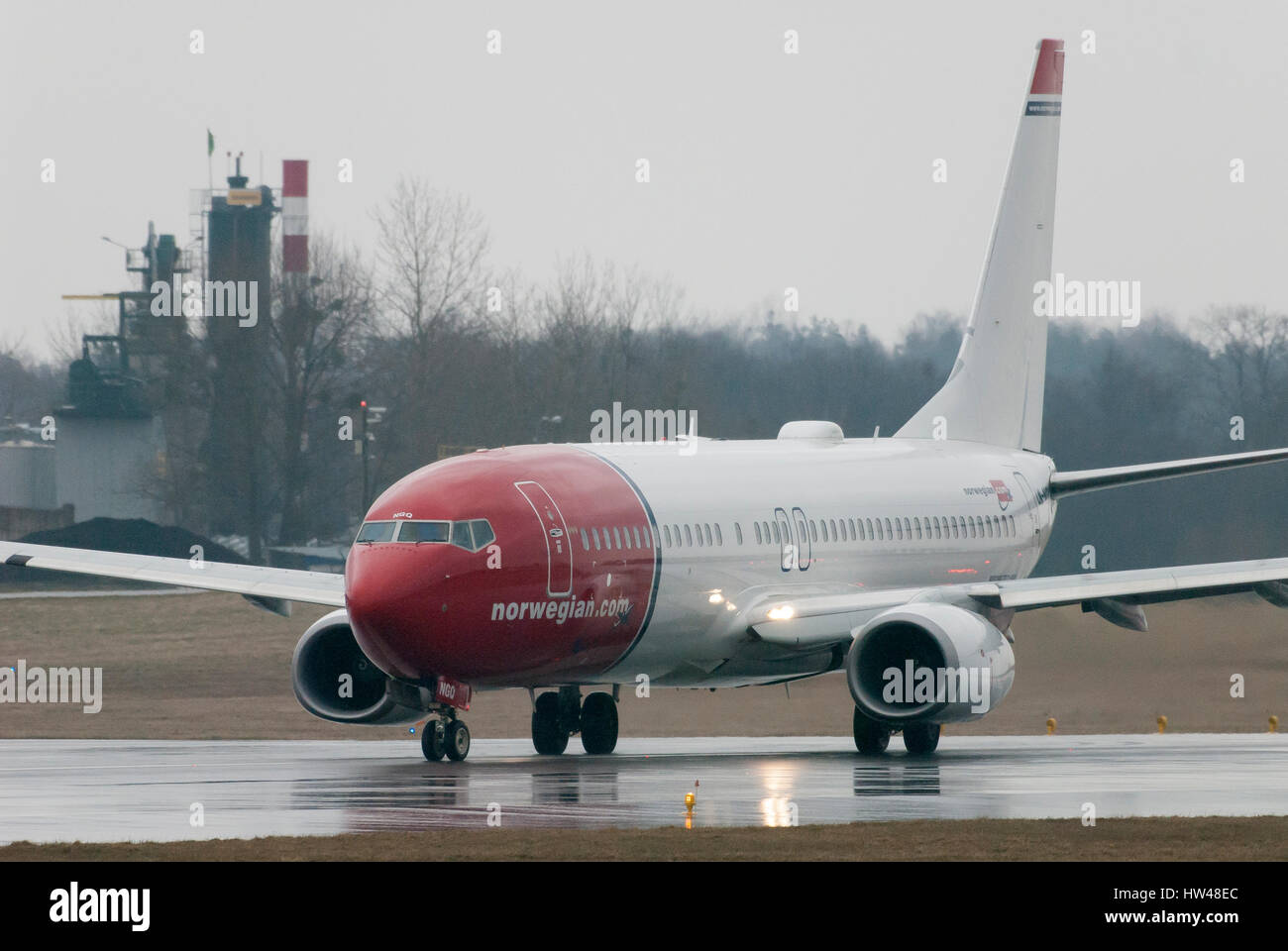 Gdansk, Poland. 17th Mar, 2017. Low cost airline Norwegian Air Lines aircraft Boeing 737 8JP is seen in rainy day on 17 March 2017 in Gdansk Lech Walesa Airport, Poland Credit: Wojciech Strozyk/Alamy Live News Stock Photo
