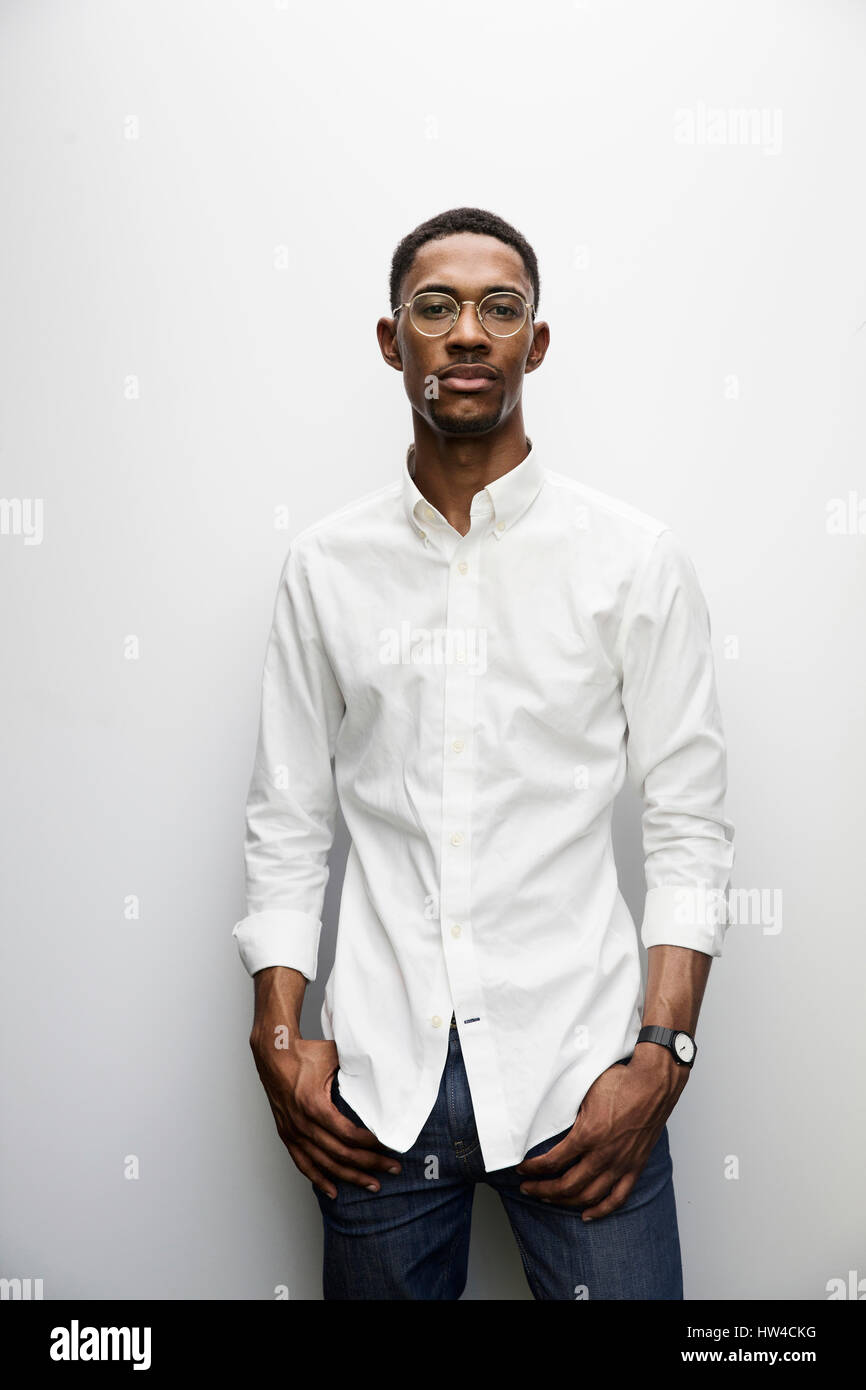 Portrait of serious Black man wearing eyeglasses Stock Photo