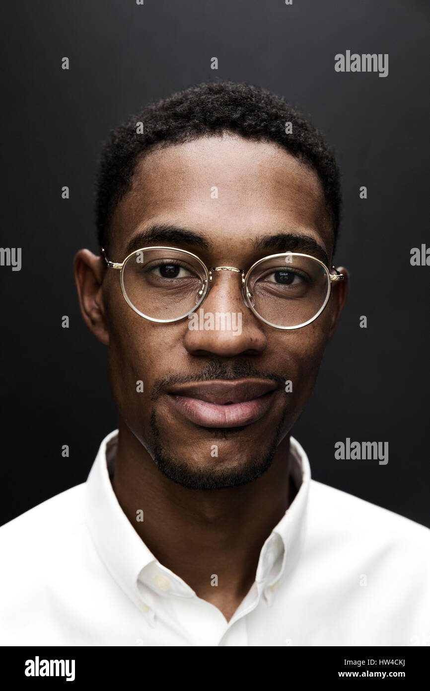 Portrait of smiling Black man wearing eyeglasses Stock Photo