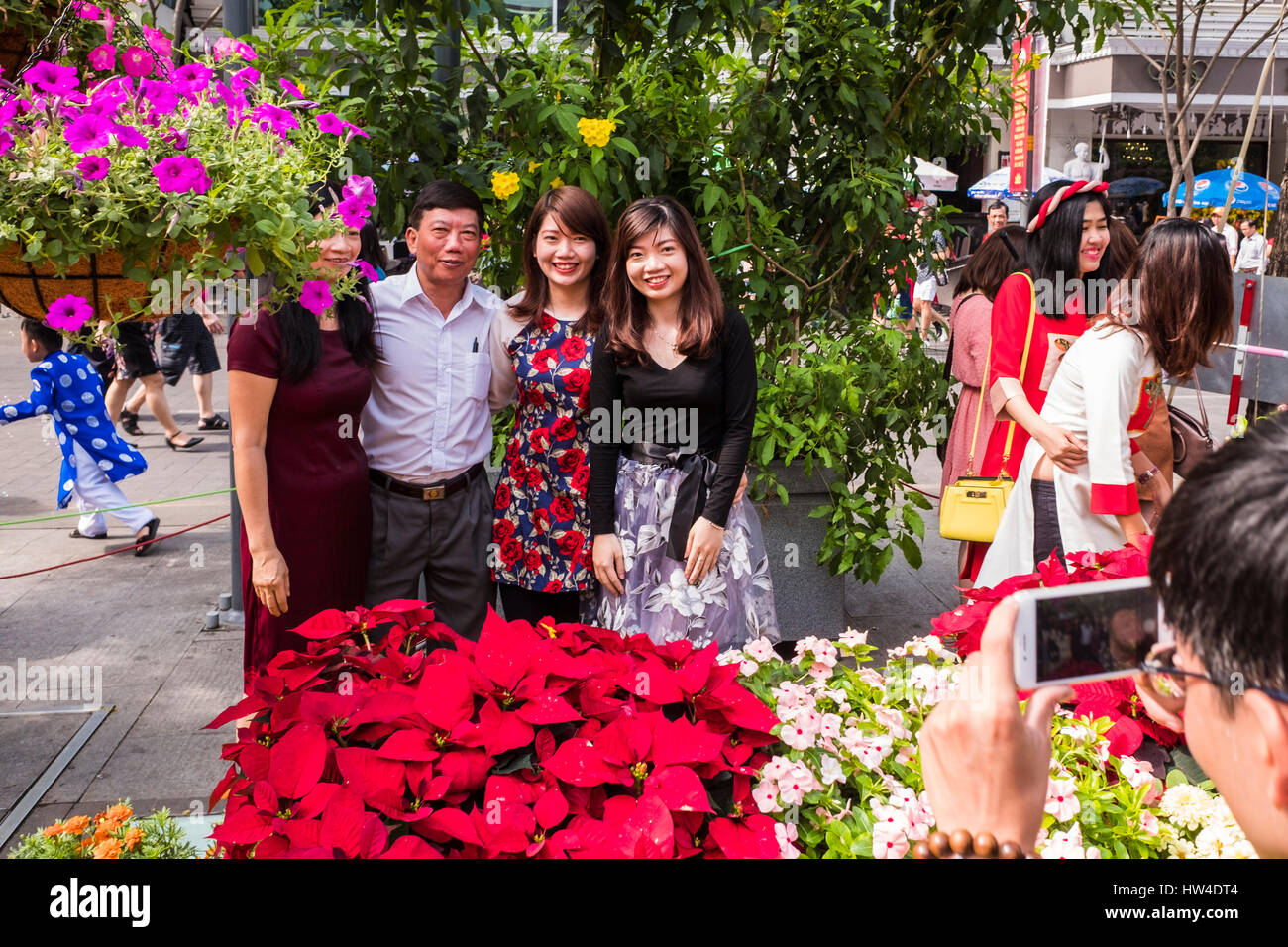 Vietnamese people enjoying the New Year(Tet) flower festival on Nguyen Hue Street, Ho Chi Minh City, Vietnam Stock Photo