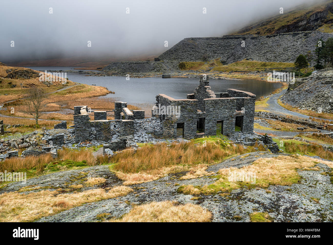 Derelict miner's cottages at the abandoned Cwmorthin Slate Quarry at Tanygrisiau in north Wales Stock Photo