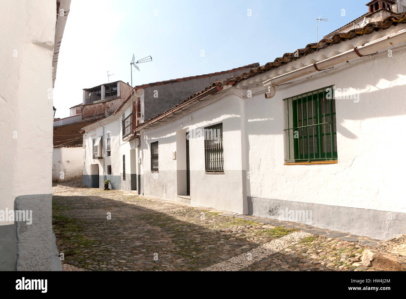 Village street and houses, Linares de la Sierra, Sierra de Aracena, Huelva province, Spain Stock Photo
