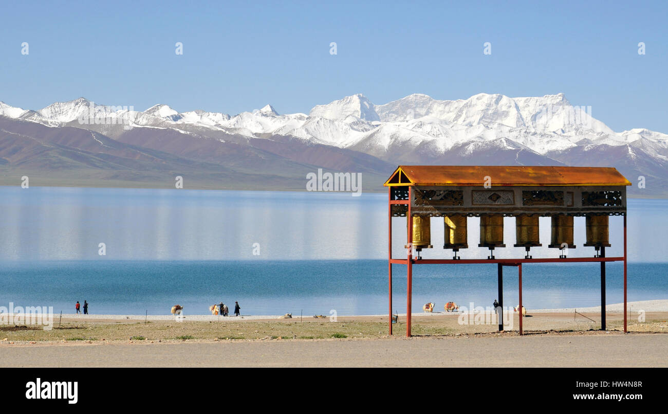 The Namtso lake and buddhist wheels on the lake coast in Tibet Stock Photo