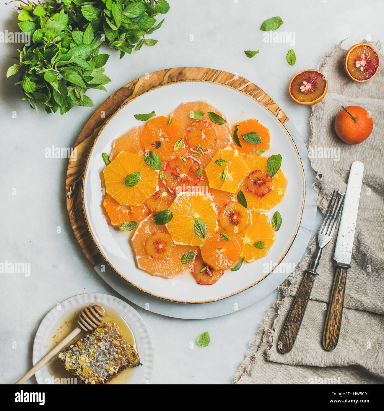 Fresh citrus fruit salad with mint and honey, square crop Stock Photo
