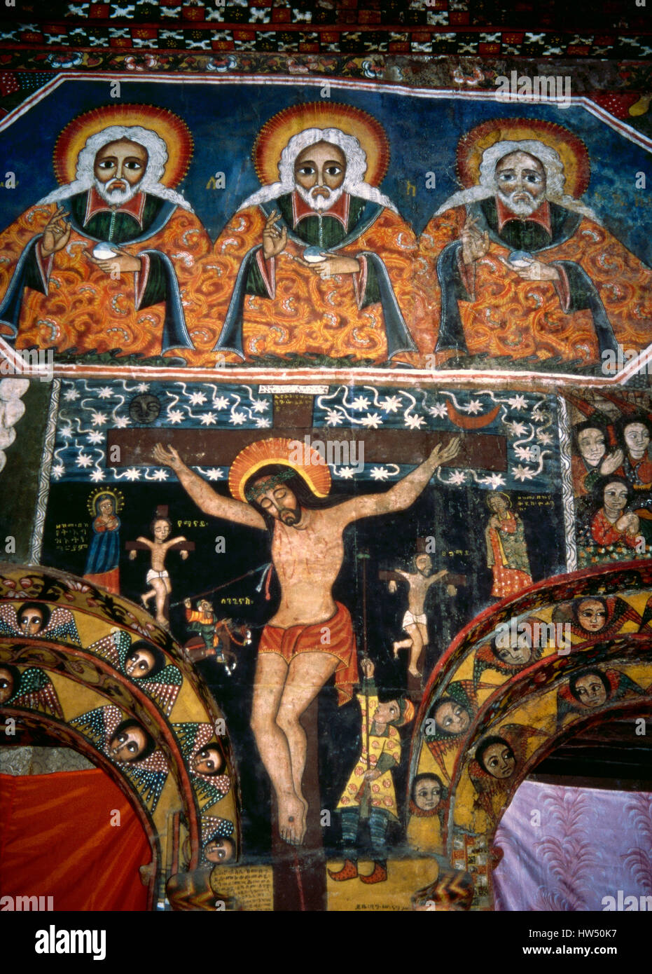 Ethiopia. Gondar. Debre Birhan Selassie Church (Trinity and Mountain of Light). Built under the Emperor Eyasu II, 17th century. Crucified Christ and the Holy Trinity. Fresco. Entrance to the Holy of Holies. Unesco World Heritage Site. Stock Photo