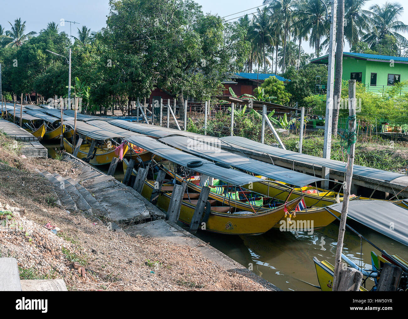 Thailand, Bangkok. Parking tourist boats Long Tail on one of the channels of the Chao Phraya River. Stock Photo