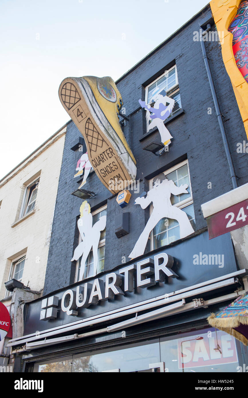 A big Converse sneaker on a facade from the "Quarter shoe" store in Camden,  London Stock Photo - Alamy