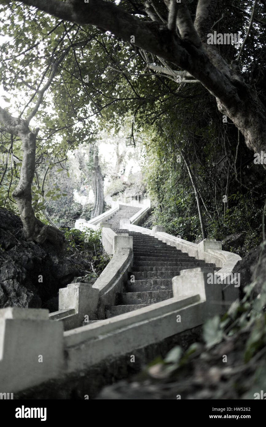 Stairs from the beautiful Mount Phou Si in Luang Prabang, Laos. Mount Phou Si is a hill known as a local religious site with several Buddhist shrines. Stock Photo