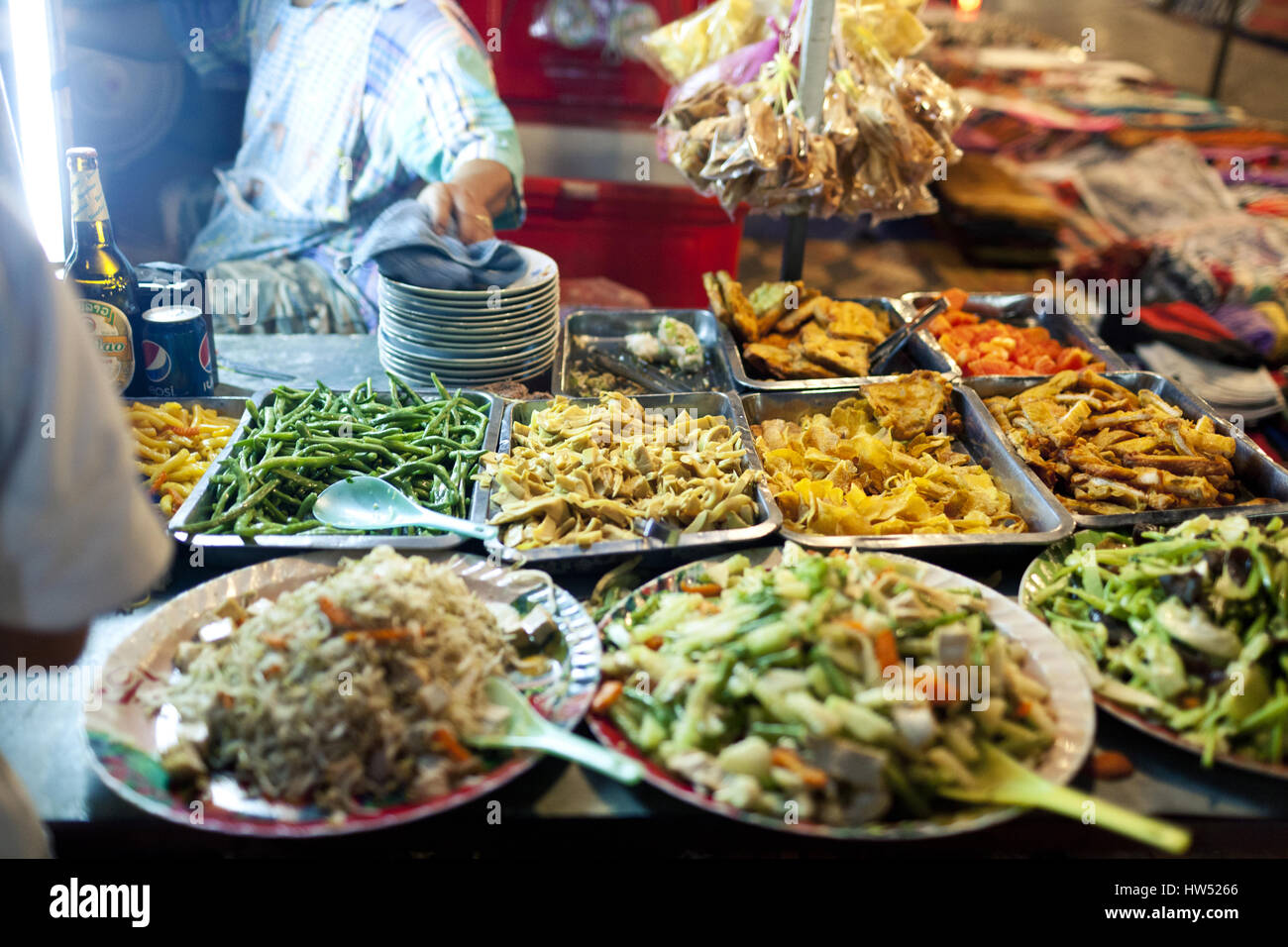 Street food selling on a local market in Luang Prabang in North Central Laos. Stock Photo