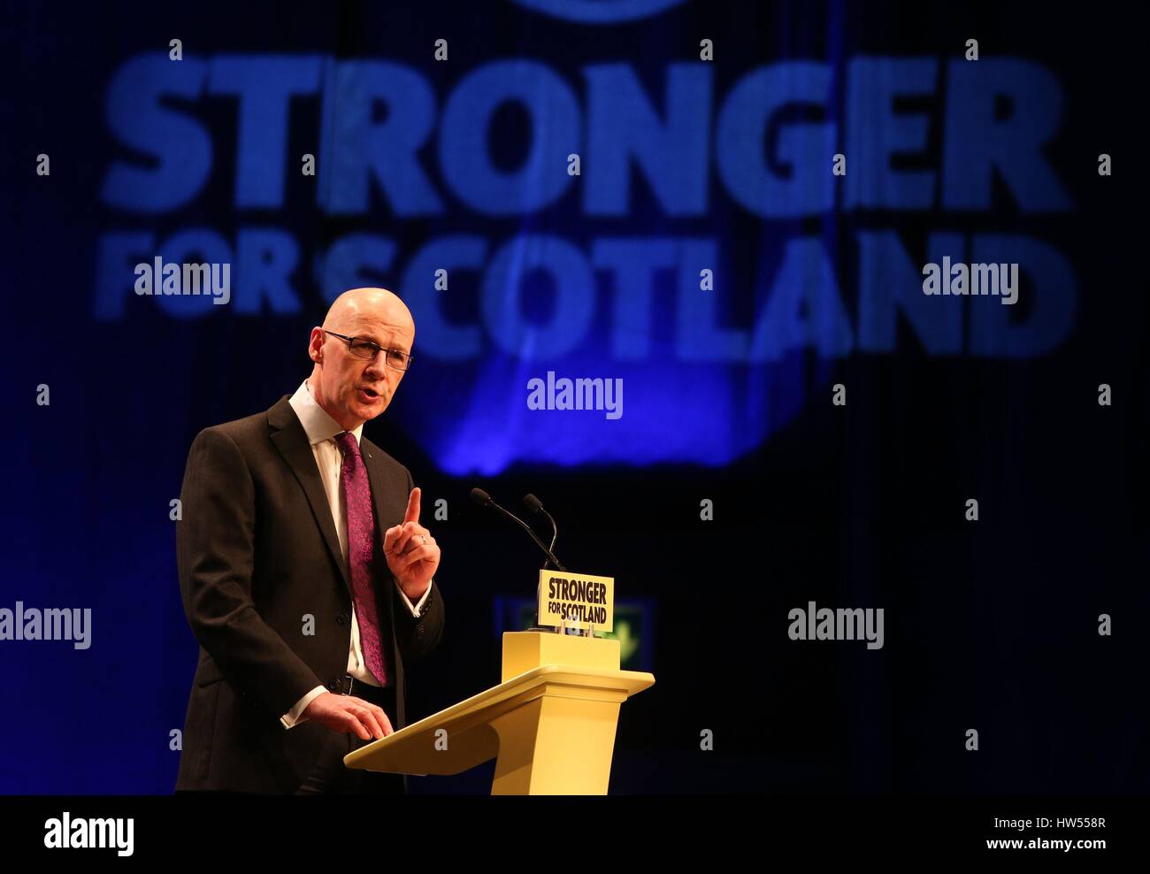 Deputy First Minister John Swinney speaks during the SNP Spring Conference at the AECC in Aberdeen. Stock Photo