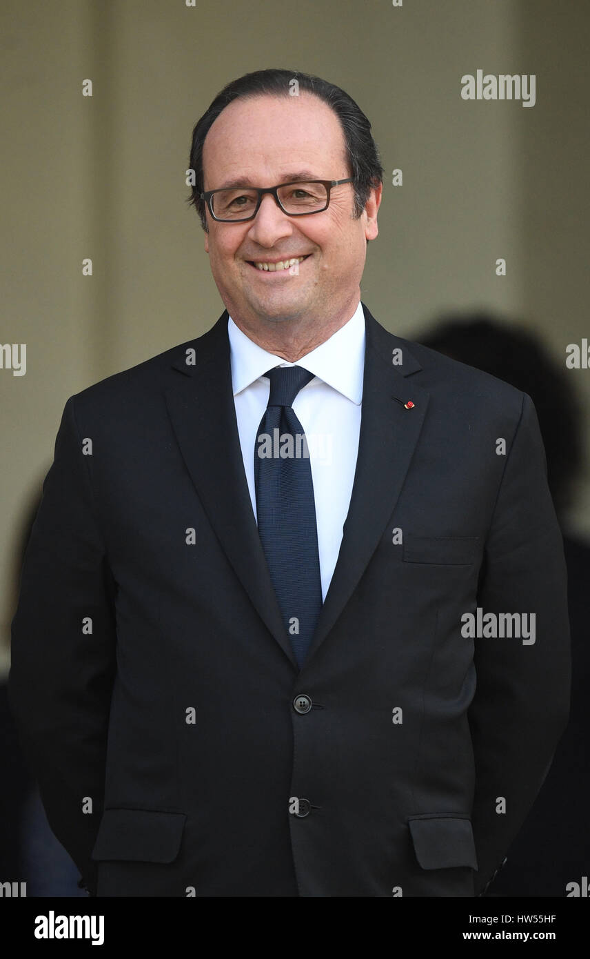 French President Francois Hollande outside the Elysee Palace in Paris ...