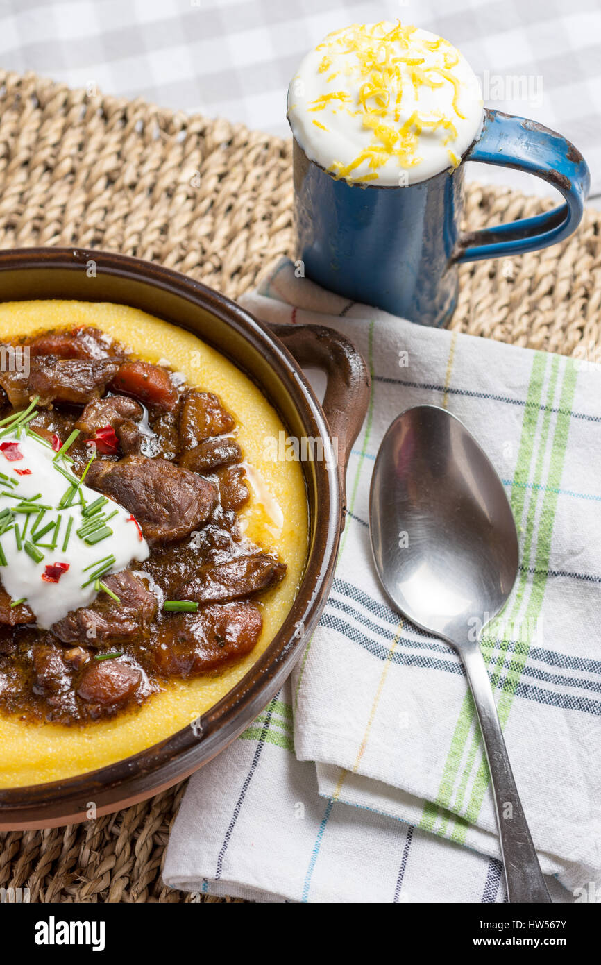 Beef Stew with Mushrooms, Carrots and Corn Polenta Stock Photo Alamy