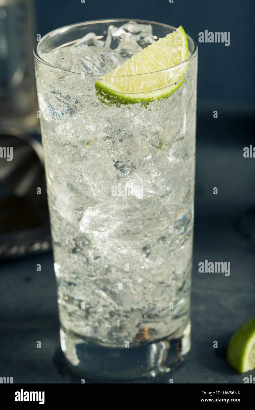Alcoholic Vodka Tonic Highball Cocktail with a Lime Garnish Stock Photo