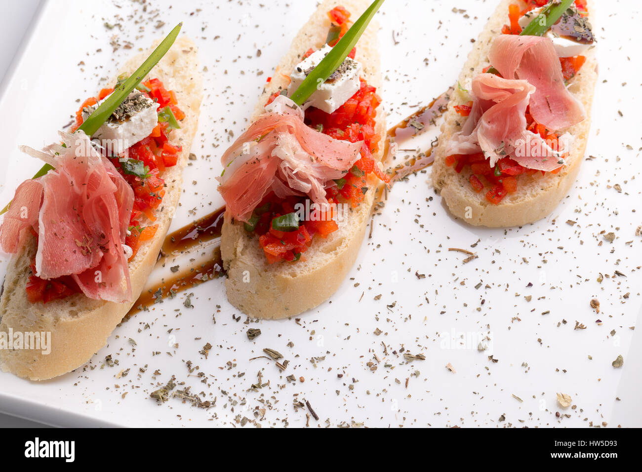 close up of bruschetta with ham. Stock Photo