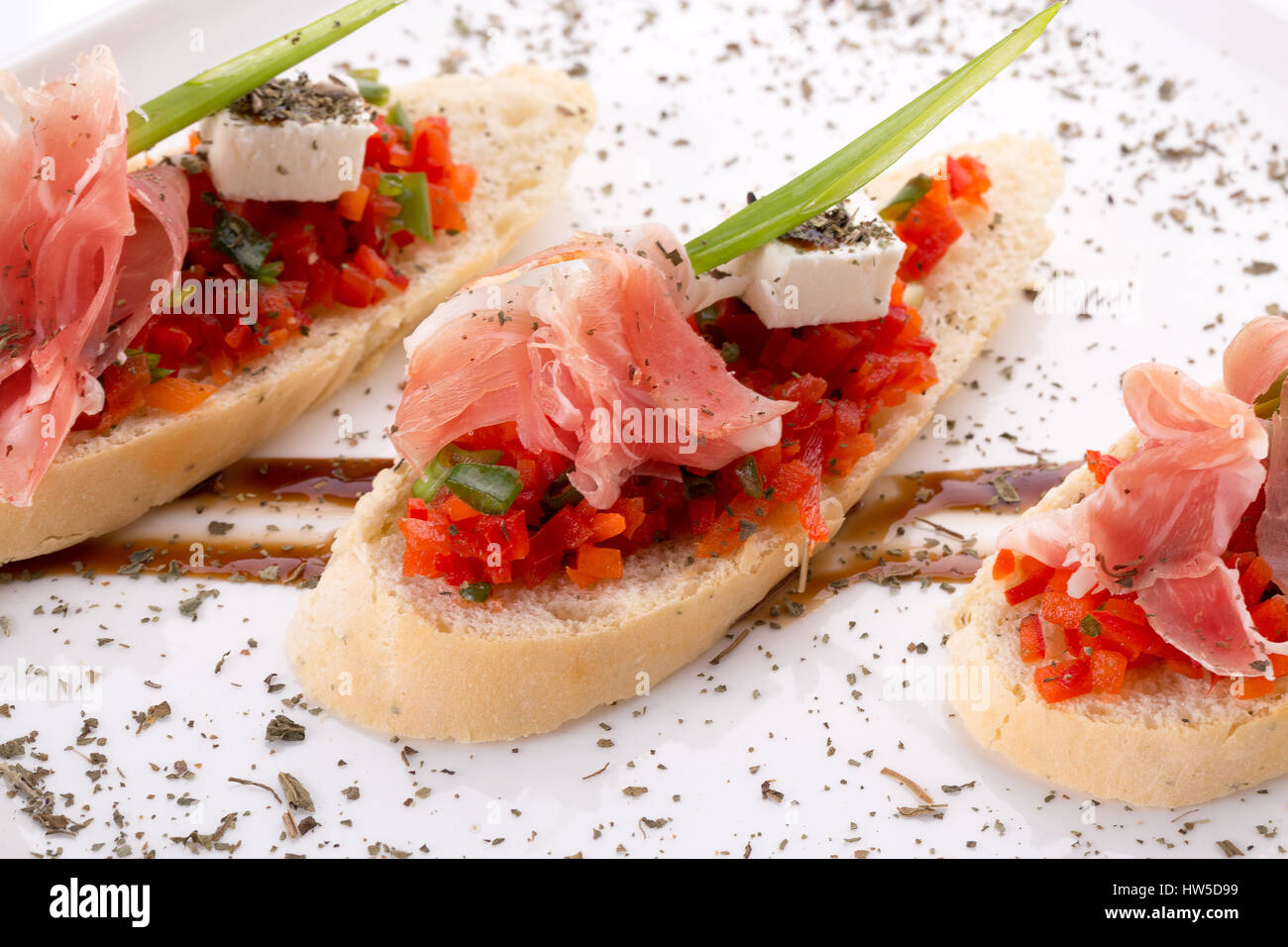 close up of bruschetta with ham. Stock Photo