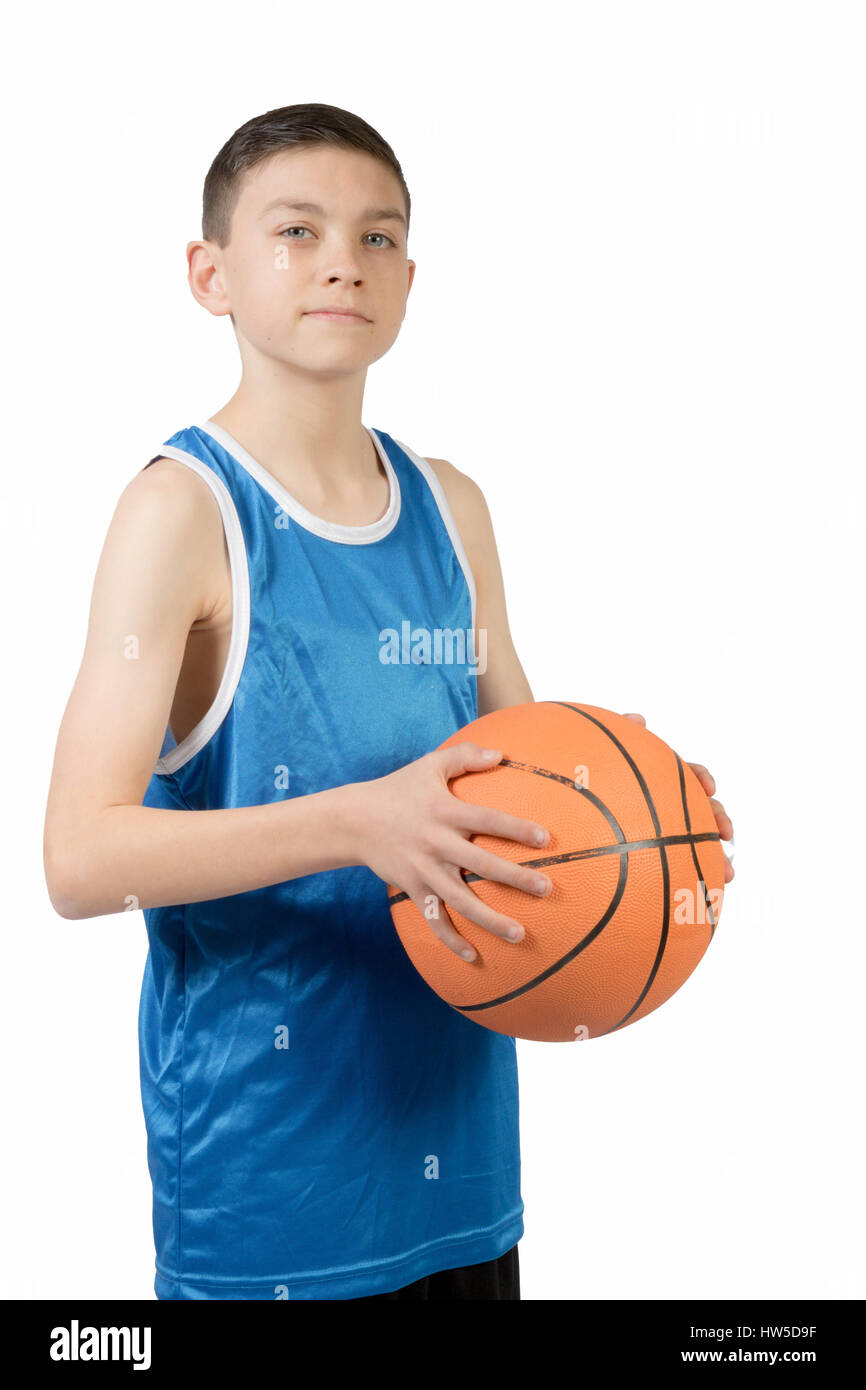 Young caucasian teenage boy with a basketball Stock Photo - Alamy