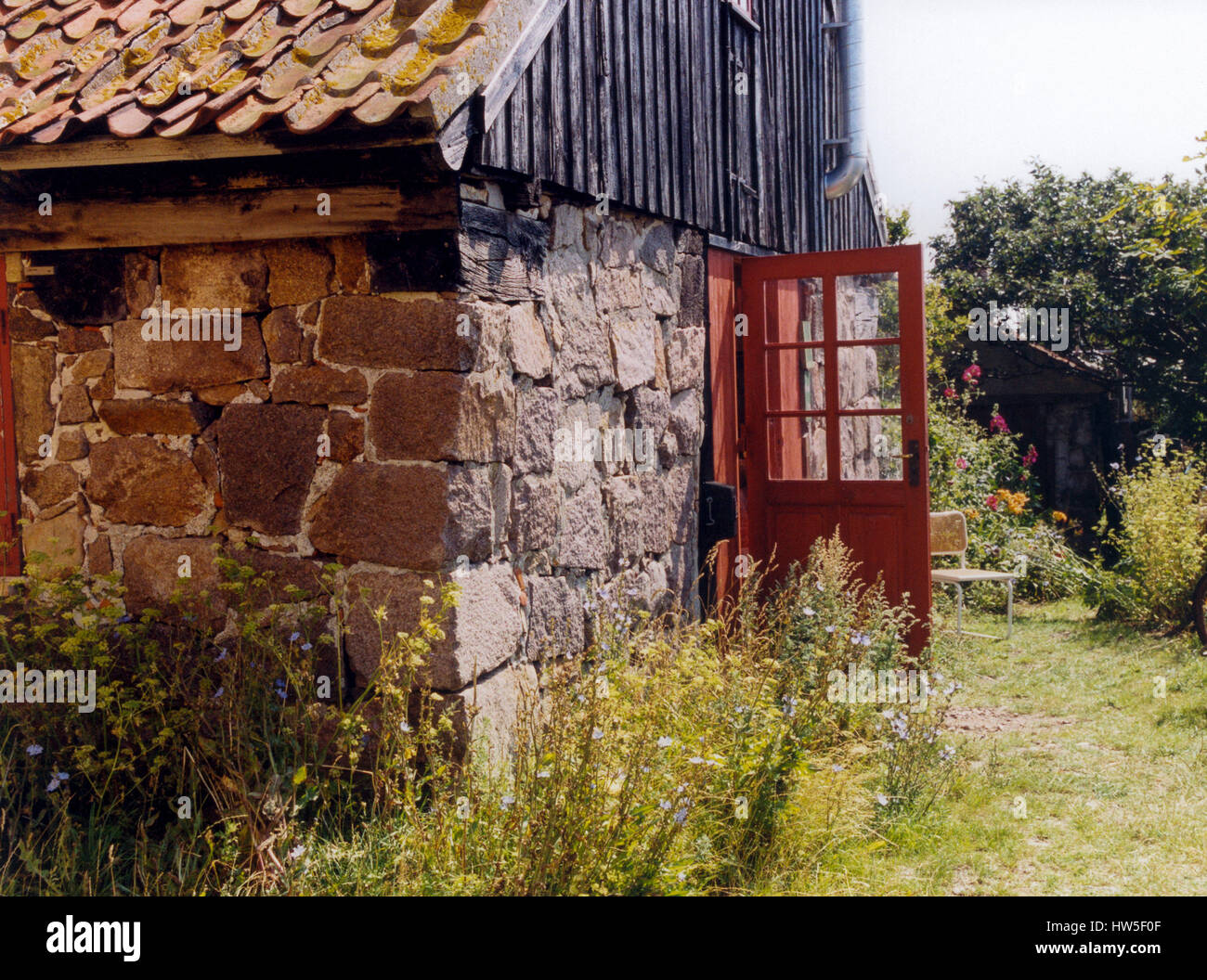 Denmark Bornholm house with an open door 2005 Stock Photo Alamy