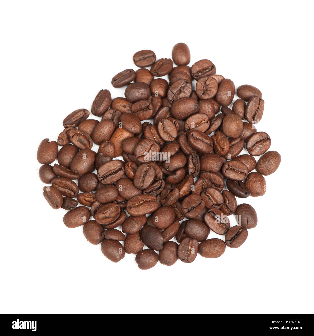 Heap of coffee beans isolated on white Stock Photo - Alamy