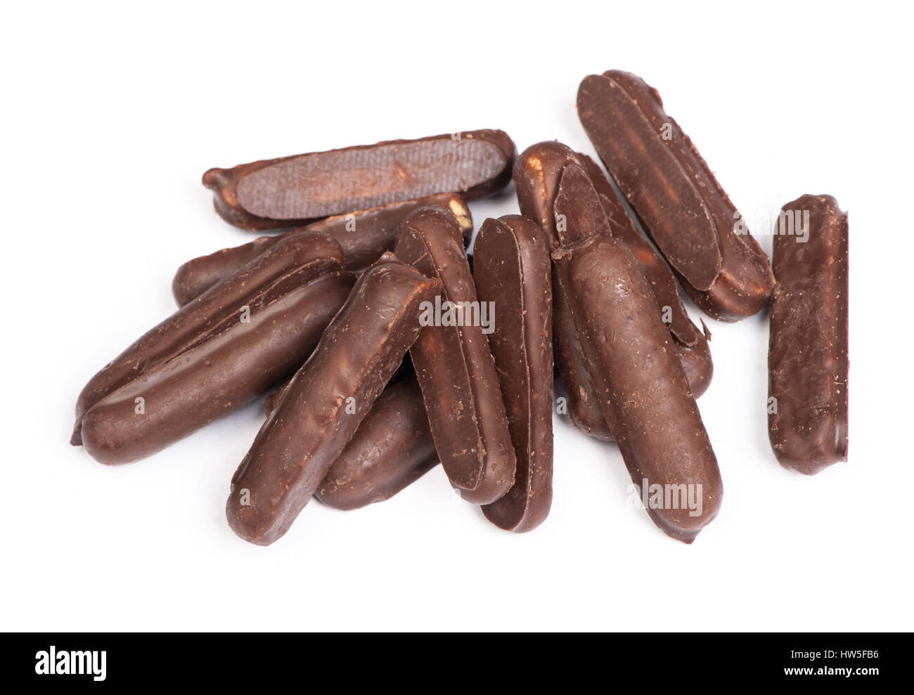 Heap of chocolate glazed stick cookies isolated on white Stock Photo