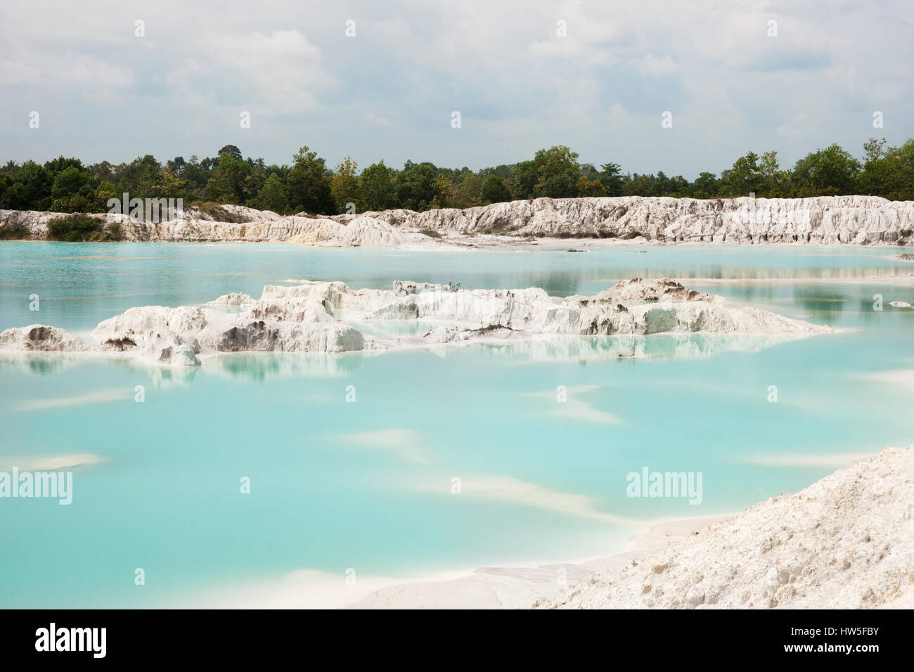 Man-made artificial lake Kaolin, turned from a mining ground holes. Land contains kaolinite and is white. Due to mining, holes were formed. and were c Stock Photo