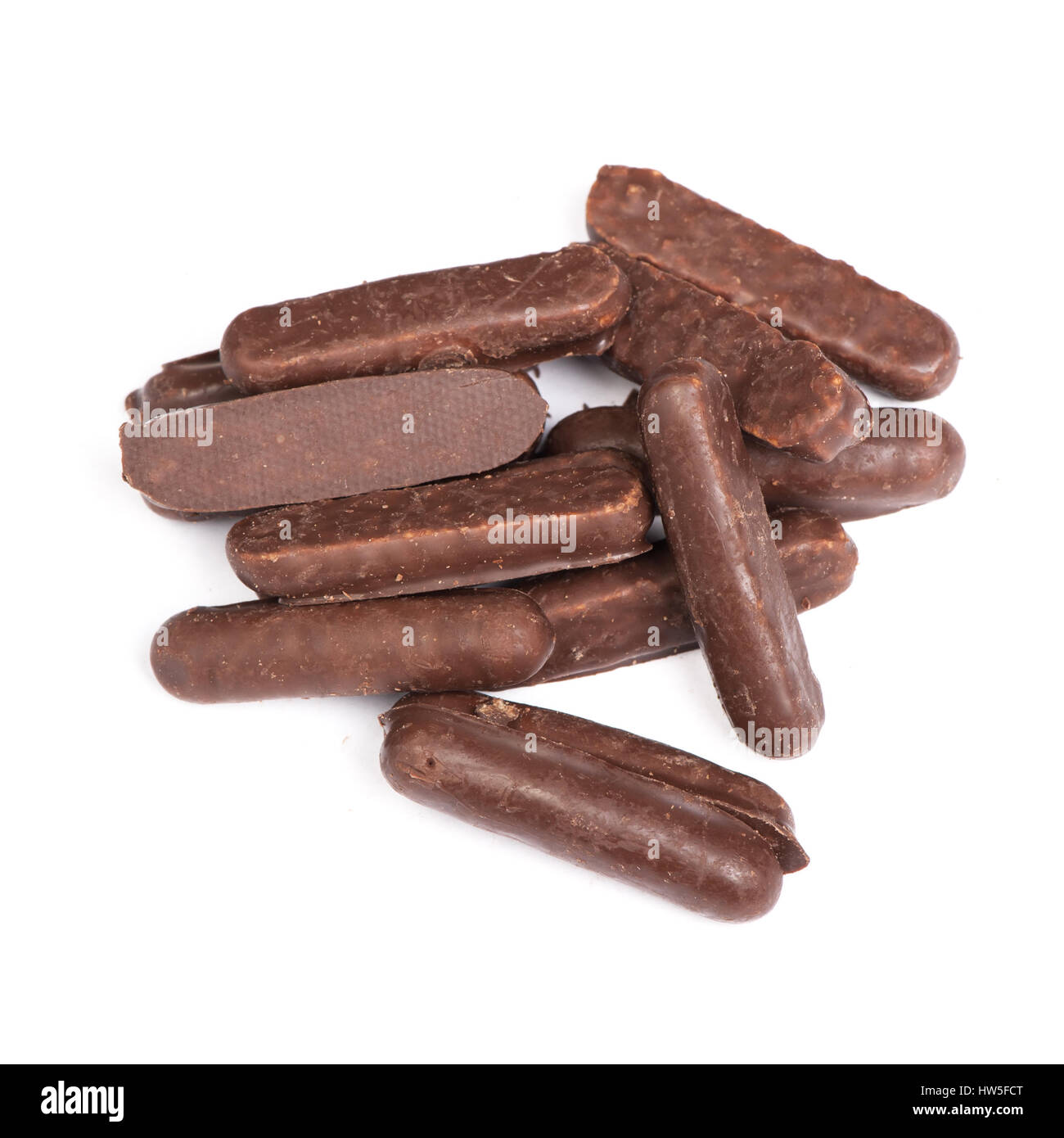Heap of chocolate glazed stick cookies isolated on white Stock Photo