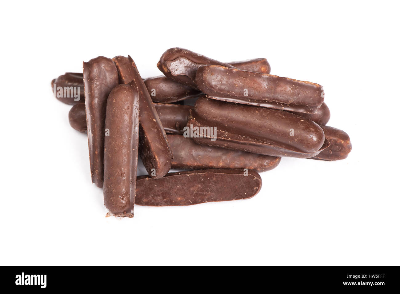 Heap of chocolate glazed stick cookies isolated on white Stock Photo