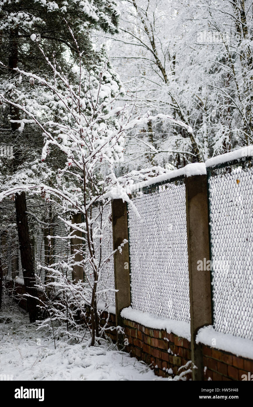 metal fence in winter covered with snow Stock Photo - Alamy