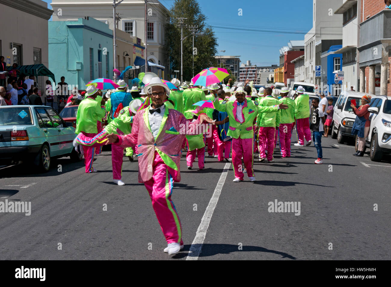 Street parade festival with music band of minstrels and dancers in carnival atmosphere,Bo-Kapp,Malay quarter,Cape Town,South Africa Stock Photo